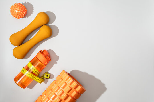 Fitness tools and equipment in a bright studio setting
