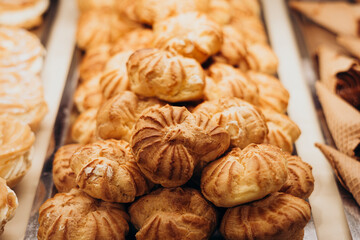 Fresh pastries and desserts in a pastry shop display window