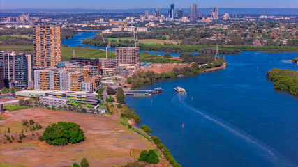 Obraz premium Panorama Aerial view above Rhodes with views to Meadowbank and Olympic park and Wentworth Point and Concord West with Parramatta River in Sydney NSW Australia