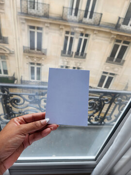UGC POV Woman Holding Blank Card Over Balcony