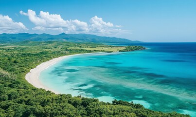 Fototapeta premium An aerial view of a pristine tropical beach with turquoise waters and lush green vegetation.