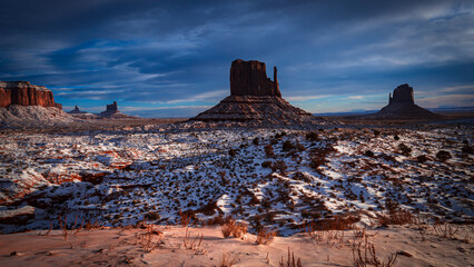 JANUARY, 2024 - MONUMENT VALLEY UTAH - winter storm on red rocks of Monument Valley with snow
