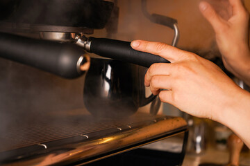 The machine's dual-boiler system allows simultaneous espresso extraction and milk steaming for efficiency.