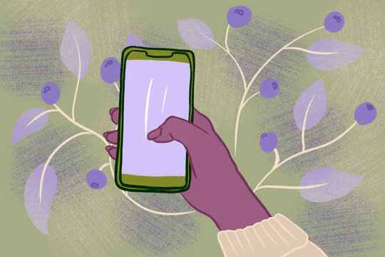 Autumn hand scrolling on phone