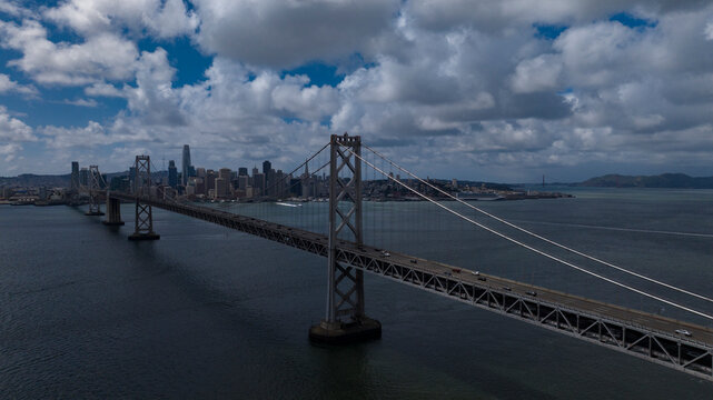 APRIL 4, 2024 SAN FRANCISCO, CA. - aerial view of Bay Bridge and San Francisco Skyline as seen from Treasure Island