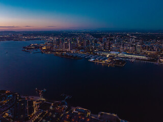 APRIL 2024, SAN DIEGO, CA. USA - aerial view of San Diego Skyline  harbor at sunset