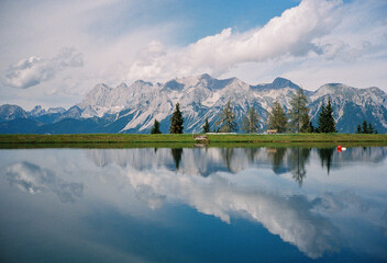 Landscape of the clear lake and mountains behind