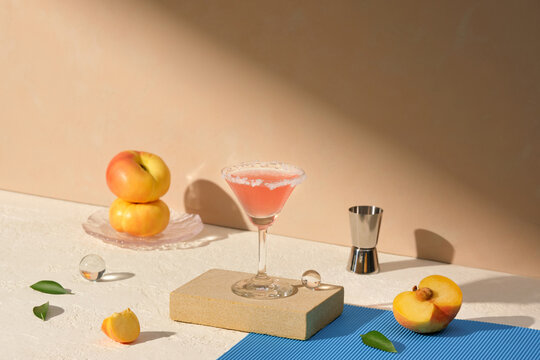 Refreshing Peach Cocktail with Fresh Ingredients on Table