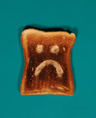 toast with frown face 