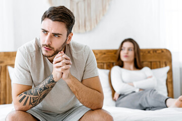 Family crisis and relationship problems. Man and woman feeling stressed and angry at each other,...