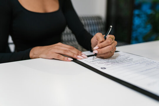 Client Writing on a Spa Document