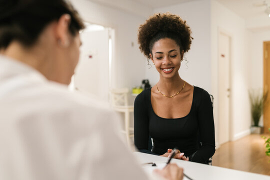 Spa Client During Skincare Discussion