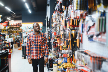 African american man standing in hardware store