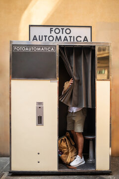 tourist in a photo booth in italy