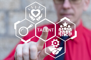 Business man working on virtual touch screen presses text: TALENT. Talent Acquisition Business...