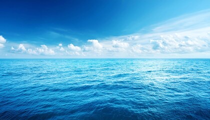 Fototapeta premium Blue sea water surface on blue sky background 
