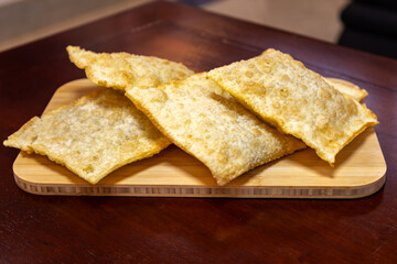 Traditional Brazilian fried pastry stuffed with ground beef. 