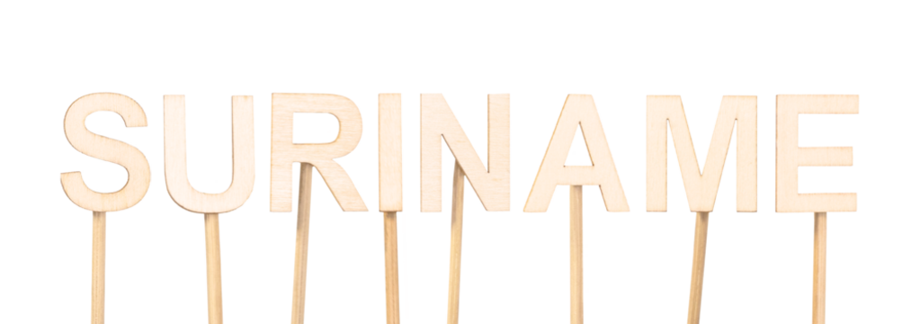 Light wood letters forming the name Suriname on white background, country in South America. Wooden title.