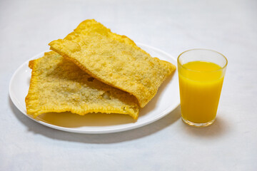 Traditional Brazilian fried pastry stuffed with ground beef. 