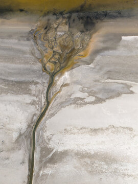 A river turning into a delta, then entering the lake