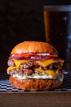 Close-up of a Juicy Cheeseburger with Double Patty and Cheddar