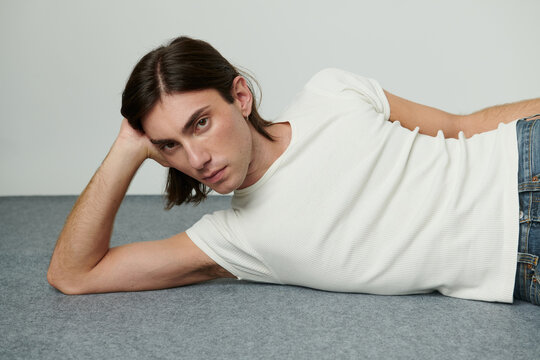 Expressive men on grey carpet