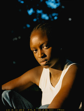 Portrait on Portra 400 film featuring a lady with a fierce, angry look