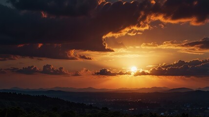 Fototapeta premium Dramatic sunset over mountains and valley.