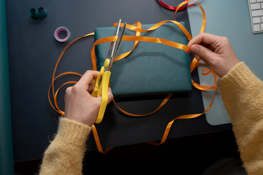 Woman packing a present