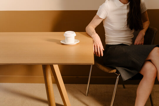 Modern Minimalist Office Scene with Coffee Cup