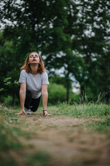 A woman in athletic attire preparing to sprint in a lush green park, capturing a moment of focus...
