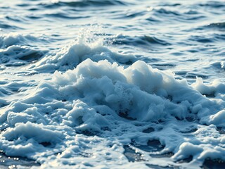 Foamy Ocean with Waves Breaking the Surface of the Water, water texture, blue ocean surface., surf zones, sea bubbles