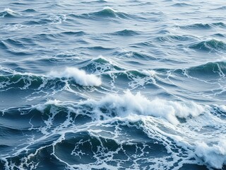 Fototapeta premium Foamy Ocean with Waves Breaking the Surface of the Water, water texture, seawater motion, foamy oceans, turbulent sea, waves breaking