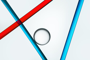 Abstract blue and red lines intersecting with a glass sphere