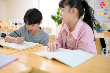 Fototapeta premium Art lesson, Teacher and students in the basic art classroom