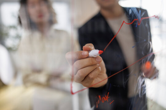 Colleagues discussing business strategy in meeting