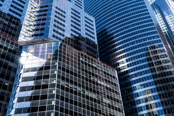 Obraz premium Building background. Glass building window. Architectural detail. Background of architecture. Modern glass background. Glass facade background. Architecture. Building architecture. Business district