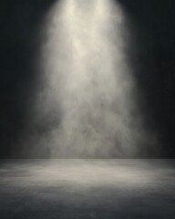 A dark room with a large, white light shining on it