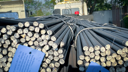 Close-up of rebar and round bar. Rebar for construction work on construction site. Round bar for...