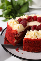 Red velvet cake, mint and berries on white background, close up
