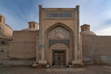 Amir Olim Khan madrasah (Amir Olimxon madrasasi) on the south side of the Po-i-Kalyan on a sunny...