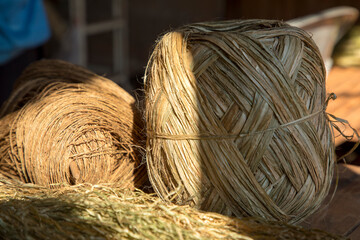 Natural fibers from hemp trees are used to make woven fabrics as folk crafts. Are clothes produced by Hmong people in northern Thailand.

