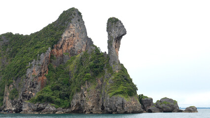 A popular rock in Thailand in the shape of a rooster's head. Khai Island in Krabi Province