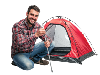 Man is sitting on the ground with a tent in front of him. He is smiling and holding a stick. Concept of adventure and excitement, as the man is preparing for a camping trip