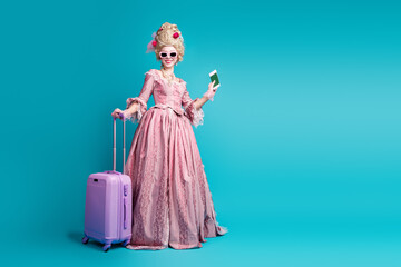 Photo of charming duchess marie antoinette medieval lady wear corset dress hold valise isolated on blue color background