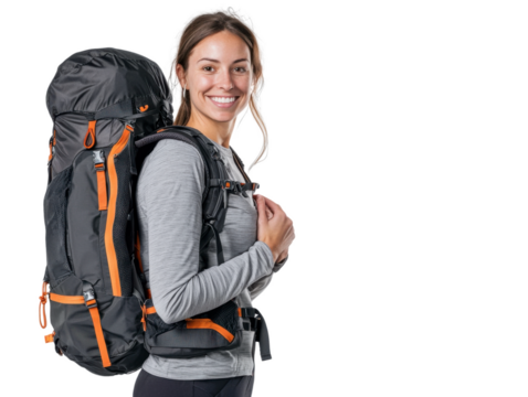 Woman is smiling and wearing a backpack