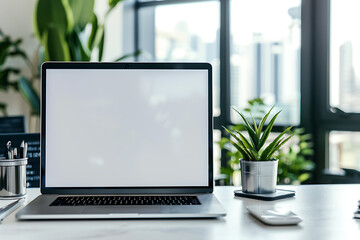 Fototapeta premium Laptop With White Blank Screen on Office Table, blank laptop display on table with window light, Desk Laptop with blank screen on table.