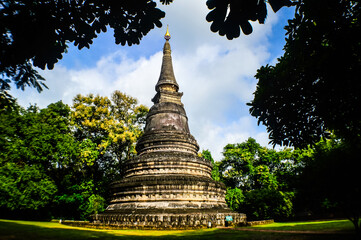 Fototapeta premium Old Pagoda , Architecture Lanna, Symbols of Buddhism at Umong Temple, Chiang Mai, Northern Thailand