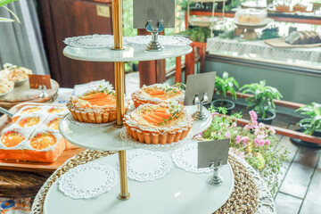 Different fruit tarts and Apple Pie in bakery shop,Traditional French sweet dessert,Delicious pastries,selective focus.