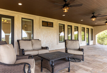 Cozy patio retreat with comfortable seating and scenic views of nature